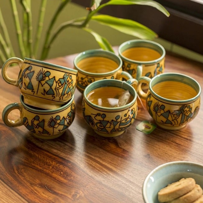 celebration in sand warli hand-painted ceramic tea and coffee mugs, tea cups and coffee mugs, exclusivelane, onlyprathamesh
